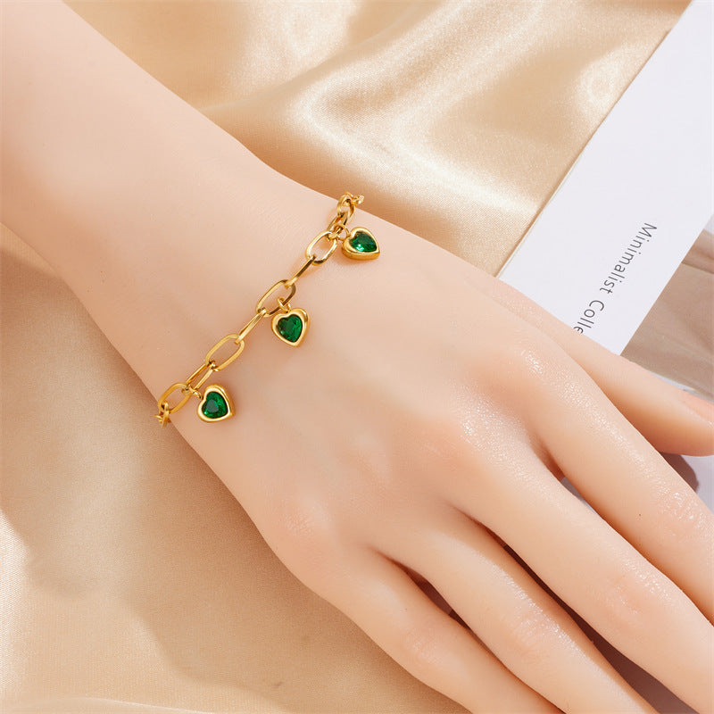 Bracciale a catena irregolare minimalista con ciondolo a cuore intarsiato di strass in acciaio inossidabile placcato oro da donna