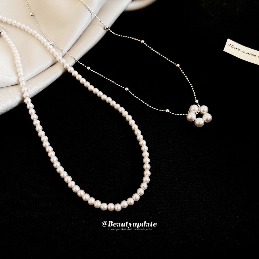 Collar de perlas redondas multicapa estilo francés vintage para clavícula en aleación con acabado chapado