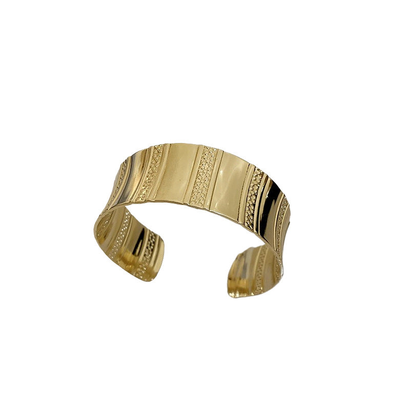 Pulsera de metal con patrón de cuadrícula geométrica de tono frío minimalista con acabado galvanizado para mujer