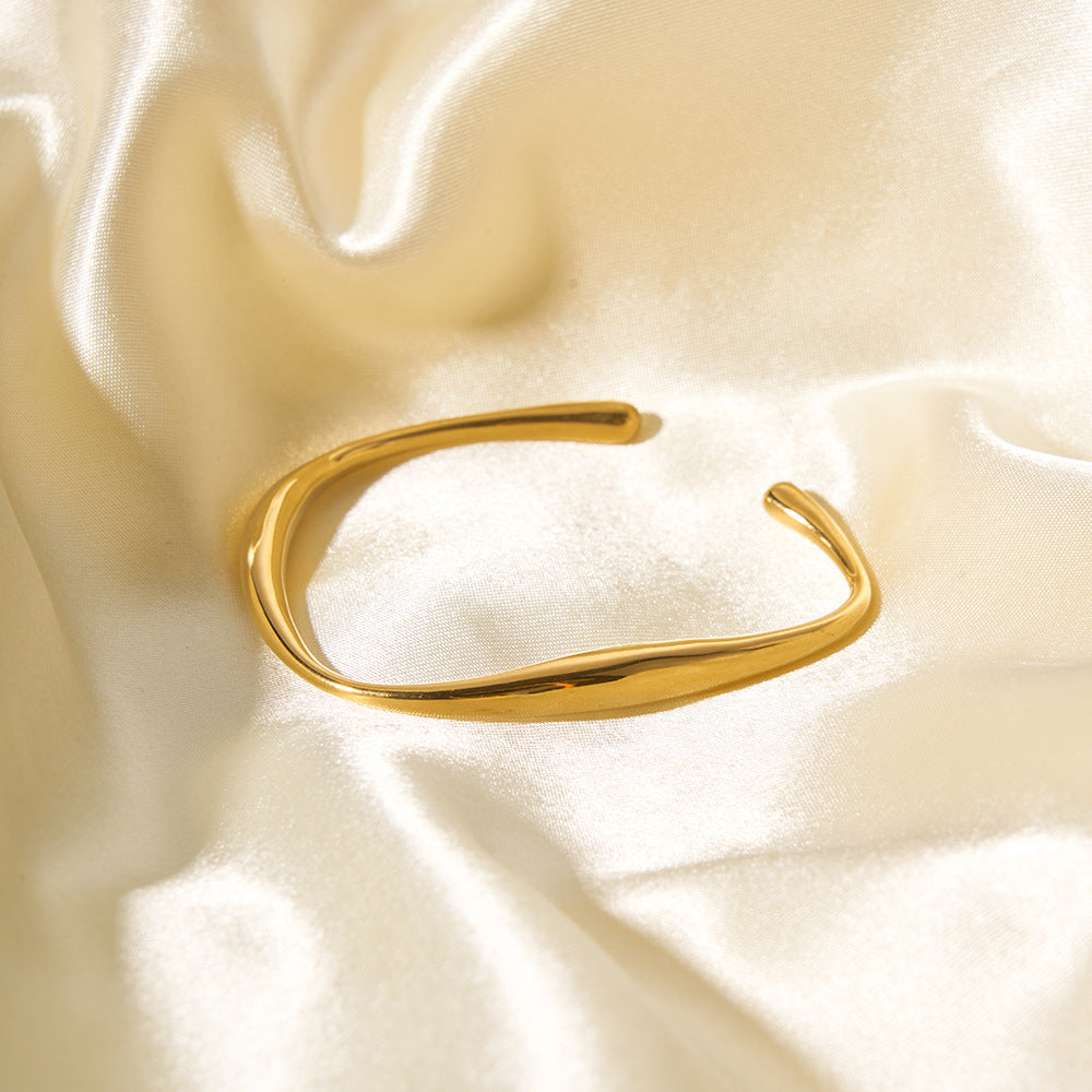 Bracciale rigido aperto geometrico minimalista da donna in acciaio inossidabile placcato oro