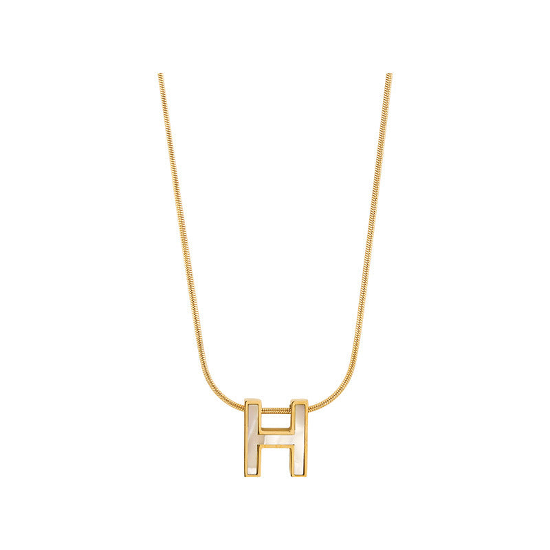 Collana con Pendente a Lettera H Minimalista in Acciaio al Titanio con Placcatura in Oro e Intarsi in Zirconi per Donna