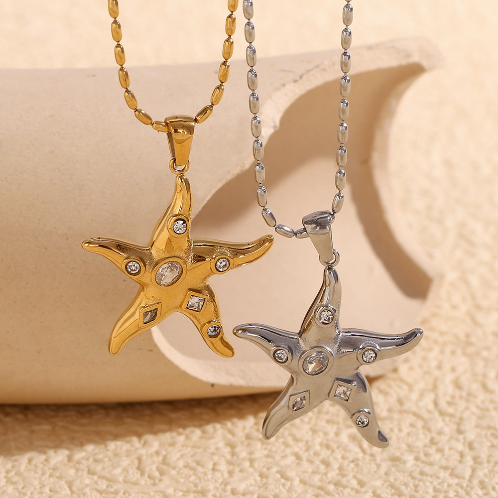Collar con colgante de estrella de mar geométrica para mujer en acero inoxidable con baño de oro de 18K e incrustaciones de circonitas