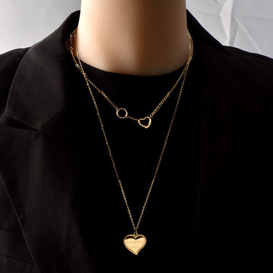 Collana da donna con ciondolo a cuore irregolare minimalista in acciaio al titanio placcato