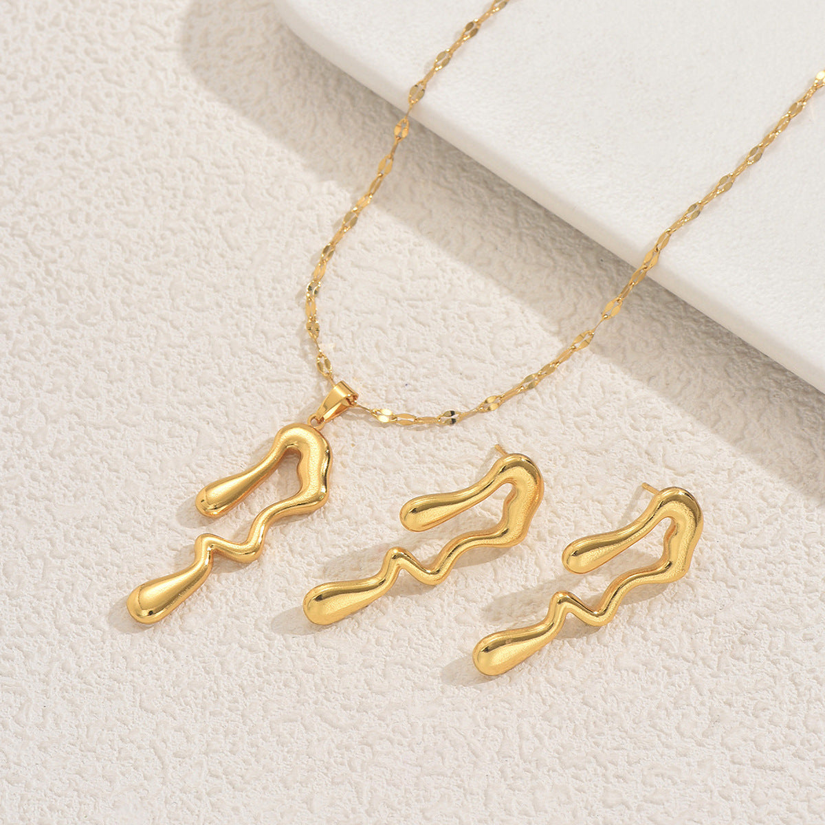 Collar de cadena con colgante irregular de estilo geométrico y pendientes a juego para mujer, chapado en aleación de zinc