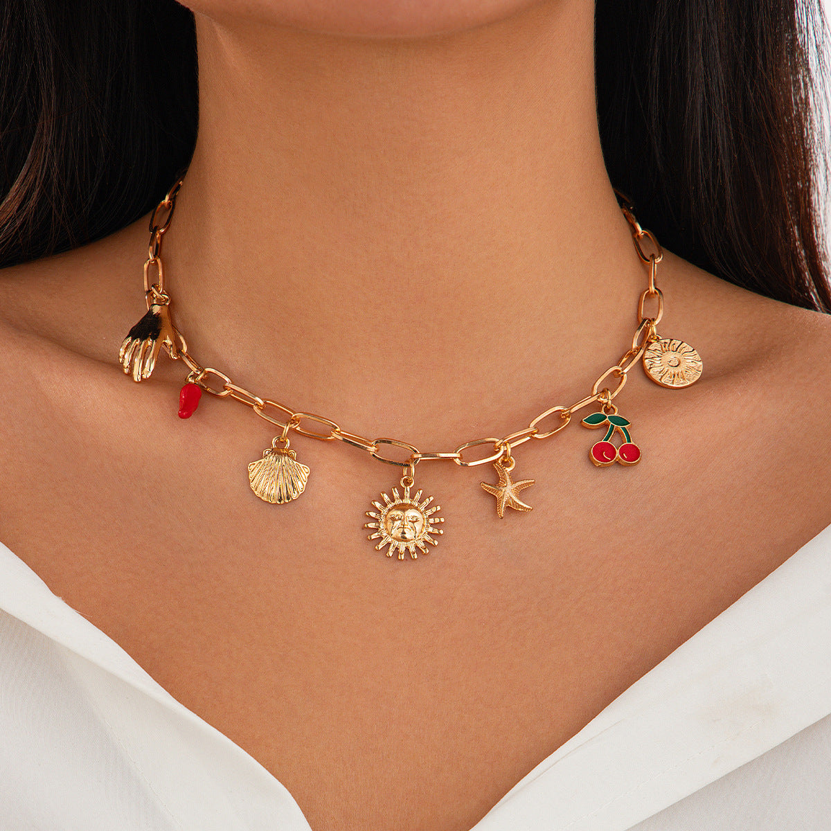 Collana pendente minimalista con stella e conchiglia, nappina e design a coda di sirena, in lega con finitura placcata