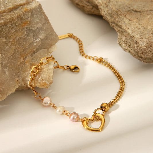 Bracciale da donna in acciaio inossidabile a forma di cuore stile vintage con inserti in perle e finitura placcata