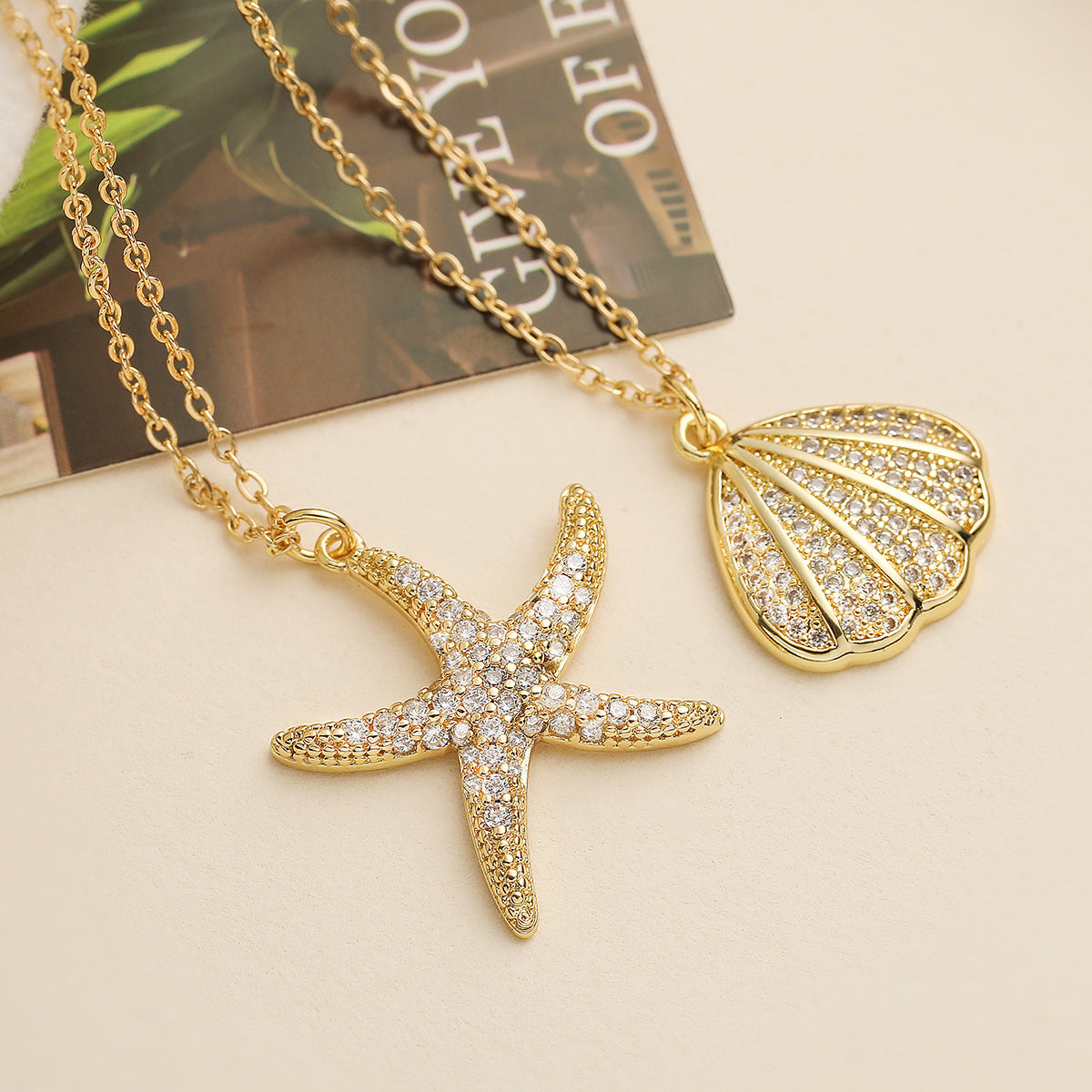 Minimalist Starfish and Seashell Pendant Necklace for Women in Copper with 18K Gold Plating and Zircon Inlay