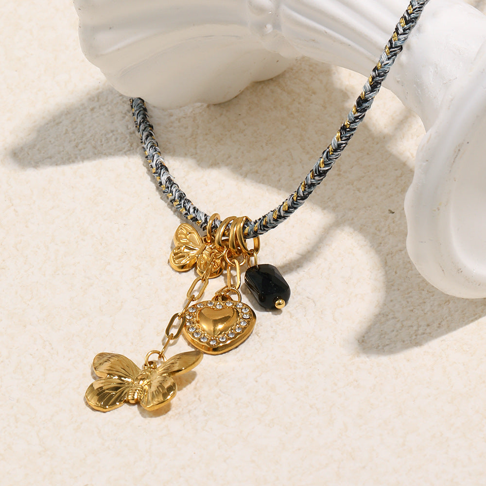 Collana pendente a farfalla minimalista in acciaio inossidabile con placcatura in oro 18 carati su cordino di cotone da donna