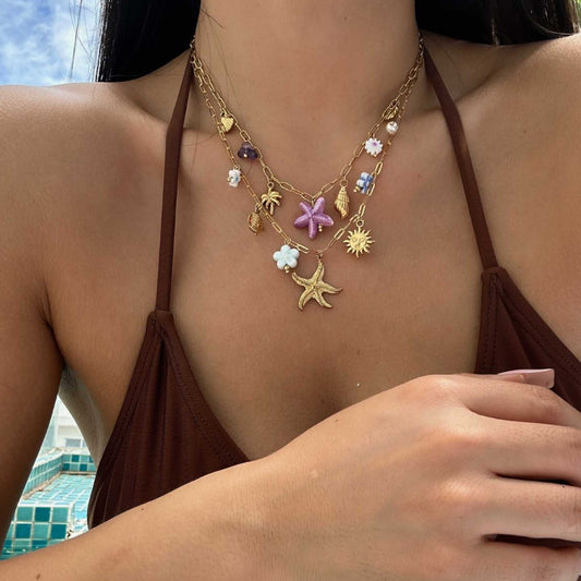 Collana con ciondolo in ceramica geometrica a stella in acciaio inossidabile casual, placcata, con conchiglia da spiaggia, stella marina, catena estiva per clavicola da donna
