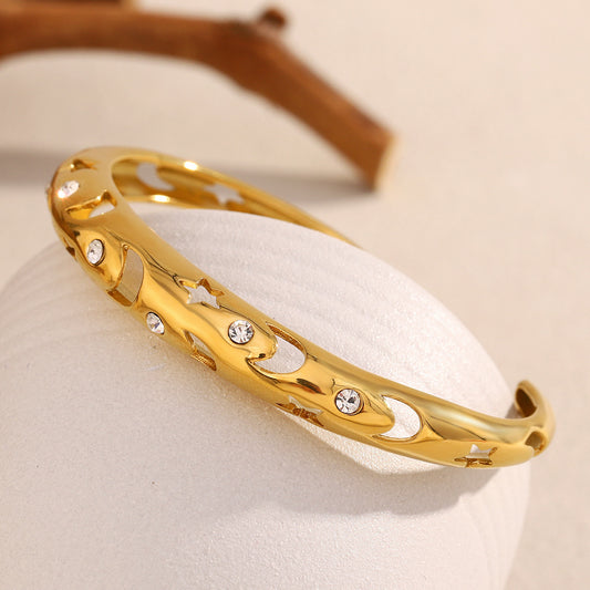 Vintage-Inspired Star and Moon Hollow-Out Rhinestone-Embellished Stainless Steel Plated 18K Gold Bracelet for Women