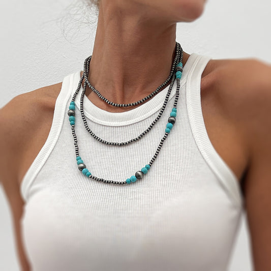 Collana da donna in resina a forma di fiocco in stile bohémien con ciondolo in lega e finitura placcata