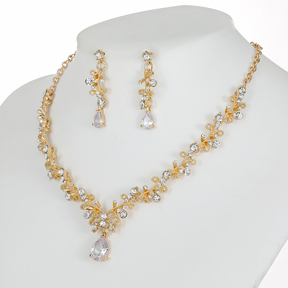 Set di collana e orecchini in lega dolce e fresca con ciondolo in cristallo a forma di campana a goccia a cuore, finitura placcata per donna