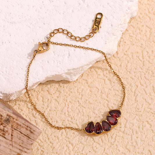 Bracciale da donna alla moda vintage geometrico in acciaio inossidabile placcato oro 18 carati con strass rossi a forma di melograno