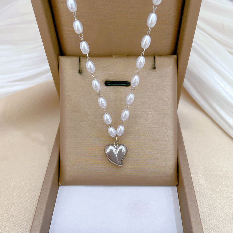 Collar con Colgante Geométrico de Corazón de Acero y Titanio Minimalista con Acento Floral