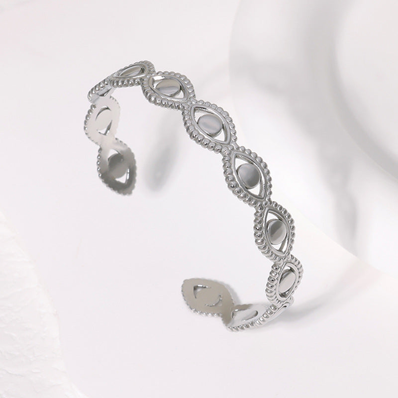 Bracciale in acciaio al titanio con design a occhio per donne, bracciale aperto in acciaio inossidabile con placcatura PVD