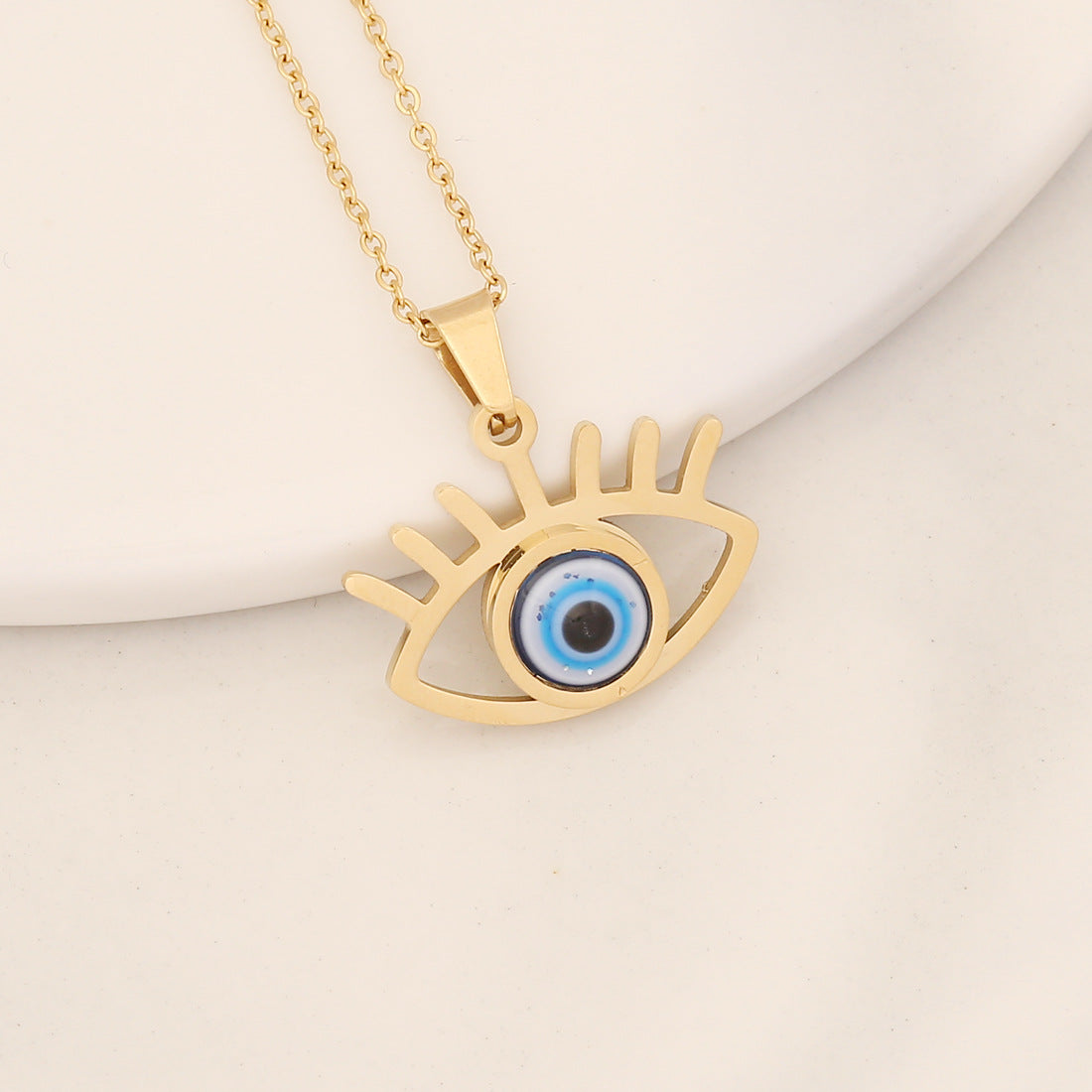 Collana con pendente a forma di occhio in acciaio inossidabile audace con finitura a olio a goccia