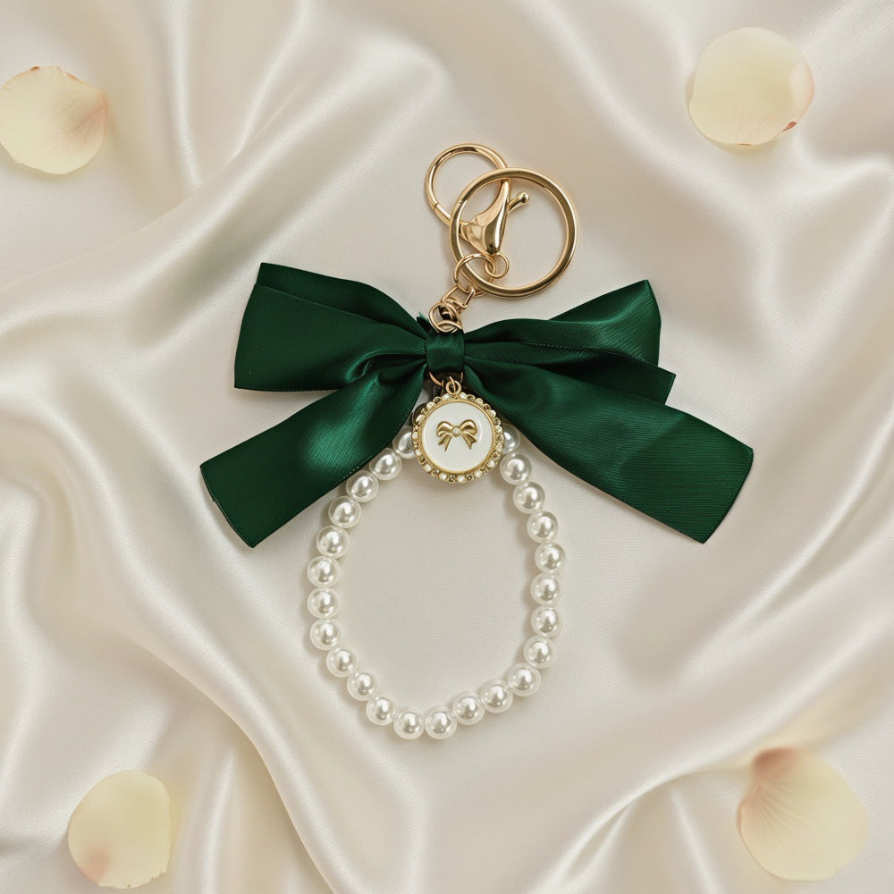 Sweet Cartoon Bow Pearl Zinc Alloy Keychain Bag Charm