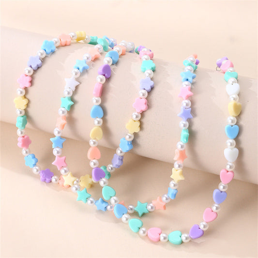 Bonito collar de cuentas de cristal con forma de lazo para niños, con colgante de aleación en cadena de cuentas redondas, para niños de 3 a 10 años.
