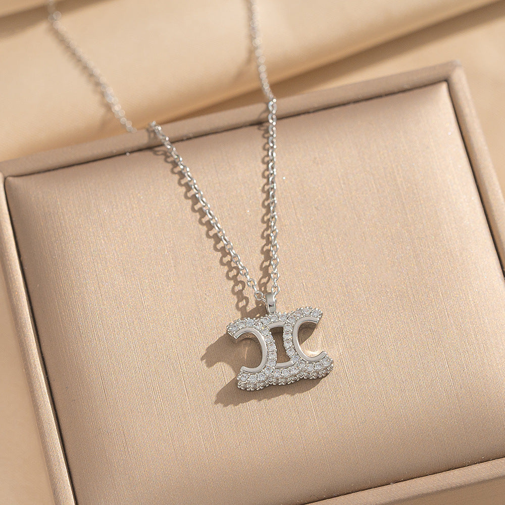 Luxury Minimalist Arc de Triomphe Pendant Necklace for Women in Titanium Steel with Gold Plating and Zircon Inlay