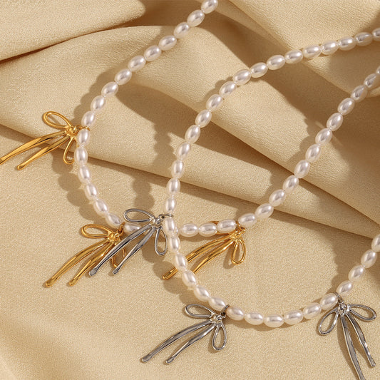 Fashionable Bowknot Pendant Necklace for Women in Stainless Steel with 18K Gold Plating and Imitation Pearl Accent