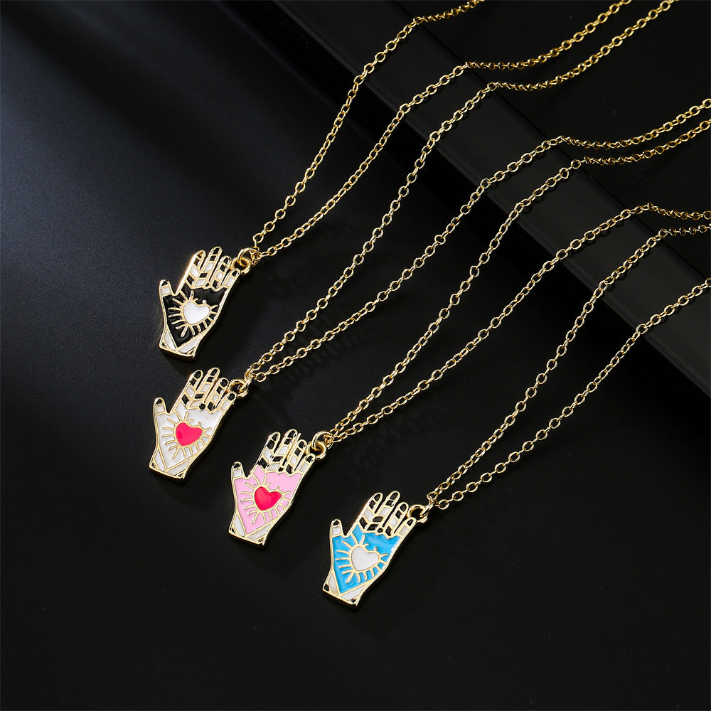 Minimalist Hand-Shaped Pendant Necklace in Copper with 18K Gold Plating and Enamel Detail