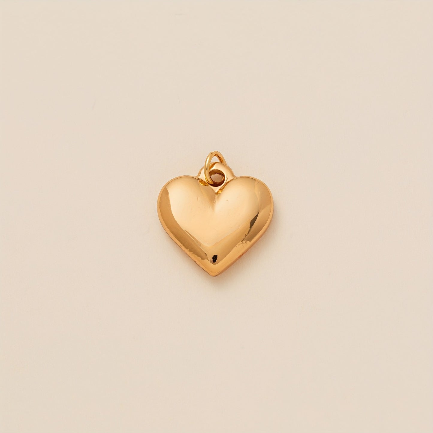 Collana con ciondolo a forma di cuore geometrico in ottone e zirconi cubici