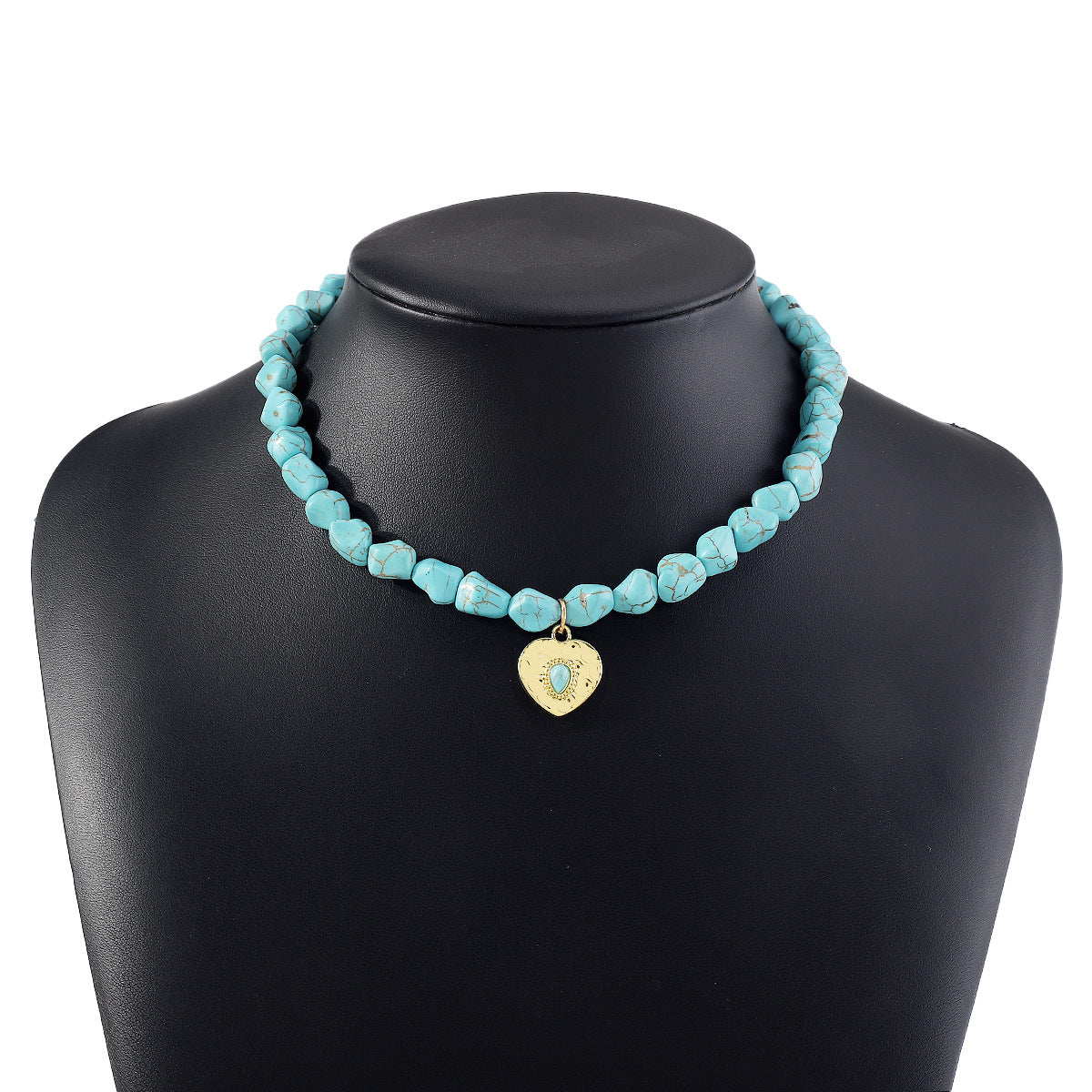 Collana con ciondolo in stile bohémien con occhio di Allah turchese e lega con forme geometriche e a cuore per donna