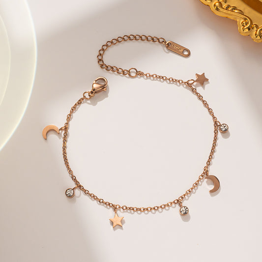 Pulsera geométrica minimalista de estrella y luna de acero de titanio chapado en oro de 18 quilates para mujer