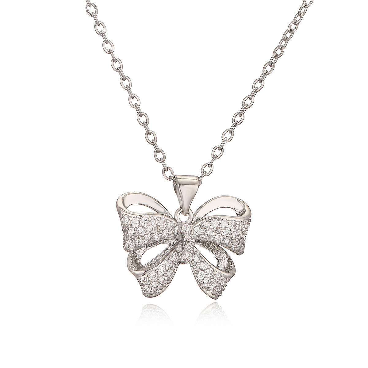 Collana con Ciondolo Minimalista a Forma di Fiocco in Rame, Placcata Oro e Zirconi per Donna