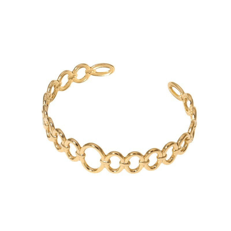 Pulsera minimalista geométrica de titanio y acero para mujer con acabado galvanizado y diseño de brazalete abierto