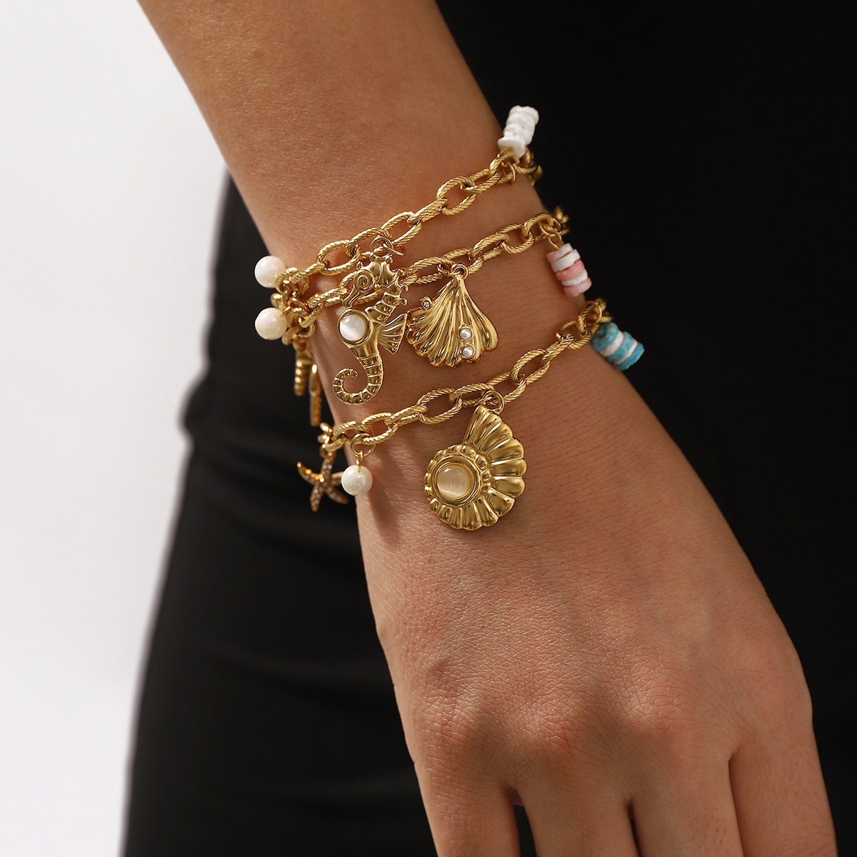 Vacation Style Seashell and Seahorse Pendant Stainless Steel Bracelet for Women with Plated Finish