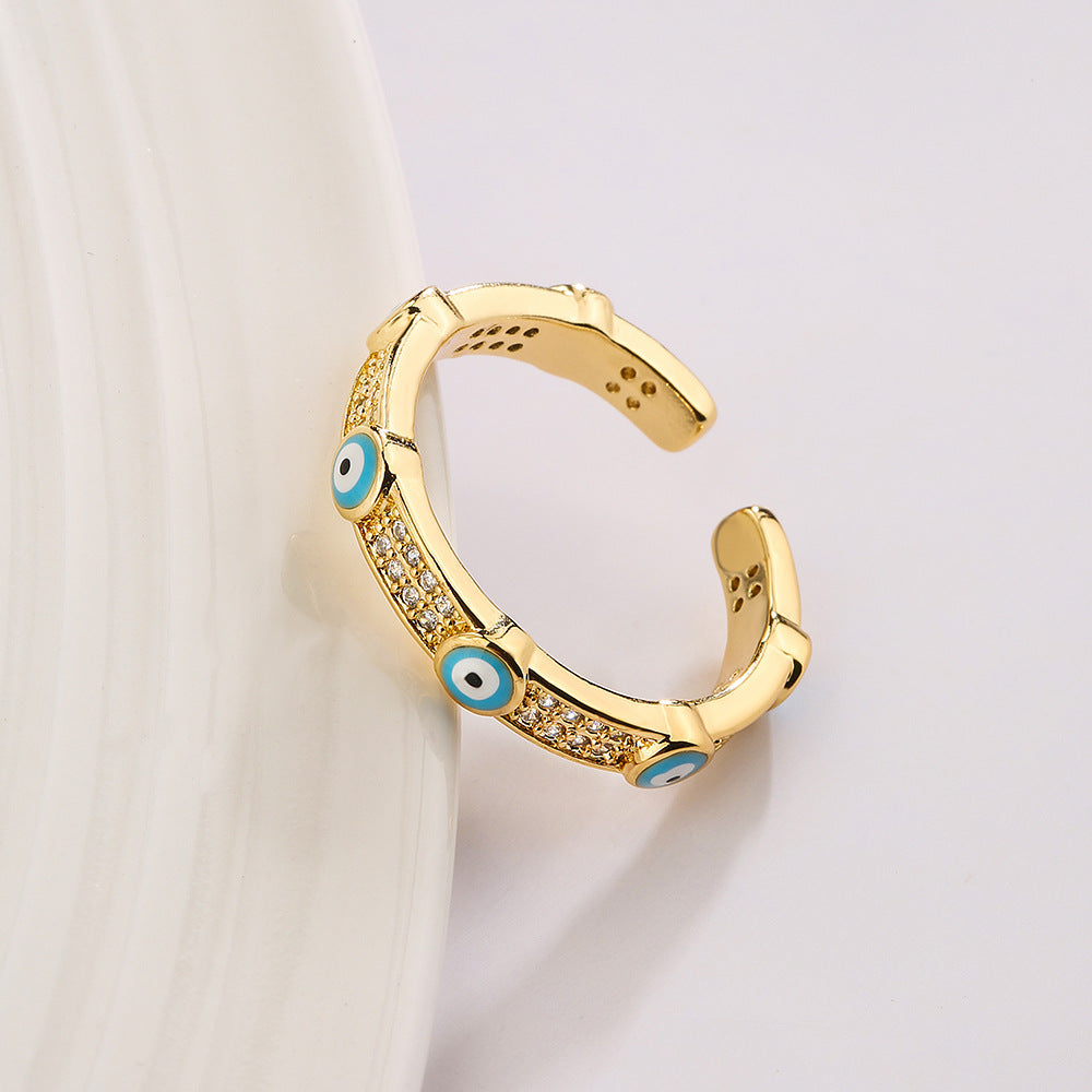 Anello Minimalista Geometrico Occhio di Allah da Donna in Rame Placcato Oro con Intarsio di Zirconi
