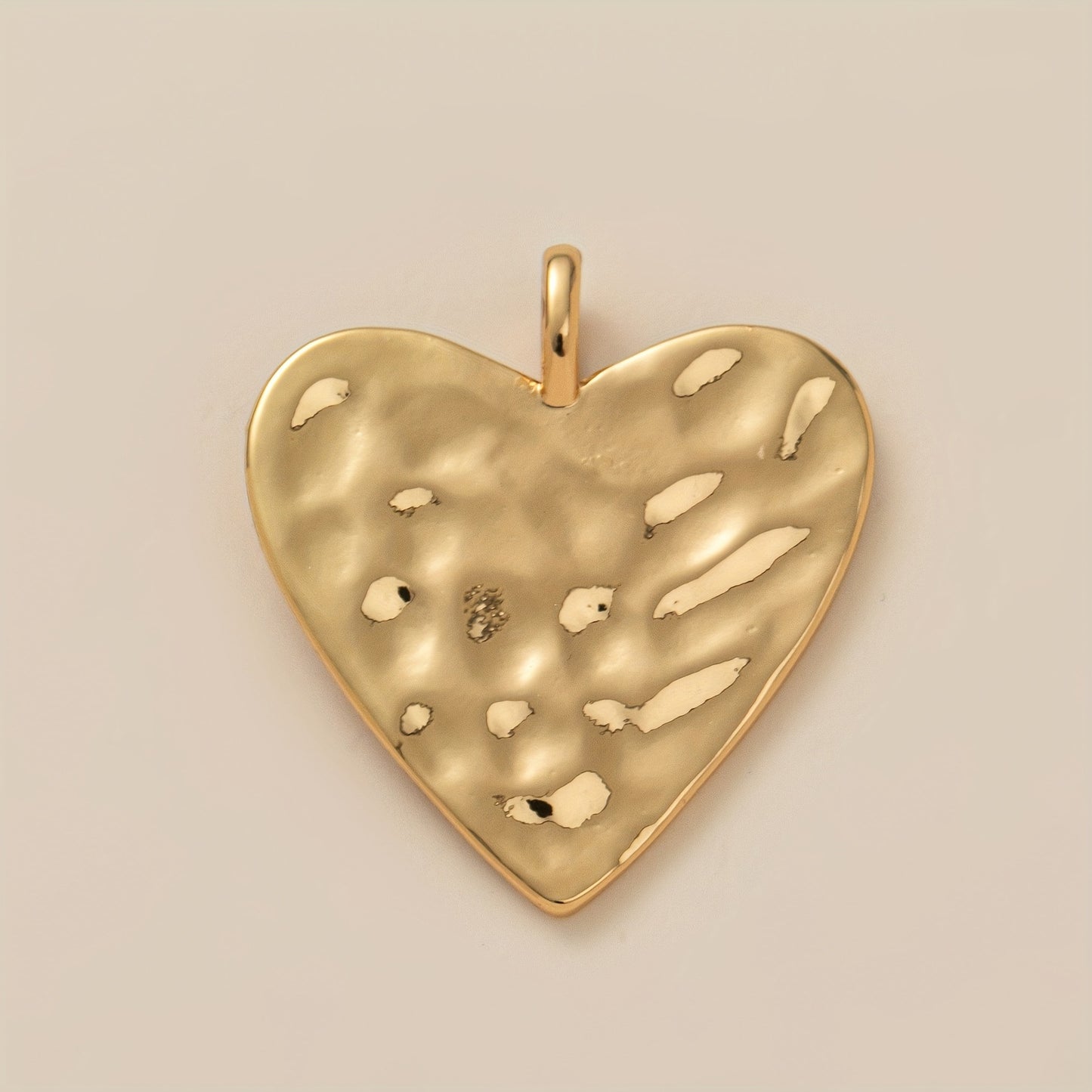 Collana con ciondolo a forma di cuore geometrico in ottone e zirconi cubici