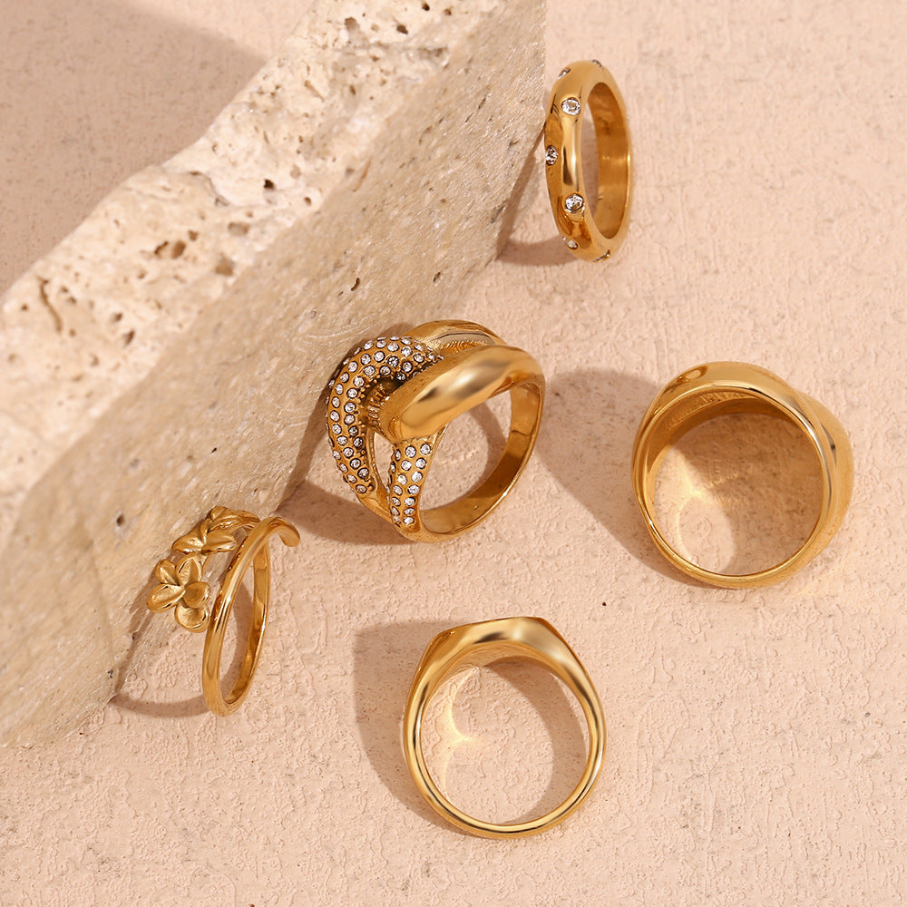 Anello in acciaio inossidabile da donna con fiore minimalista e forma geometrica placcato in oro 18K
