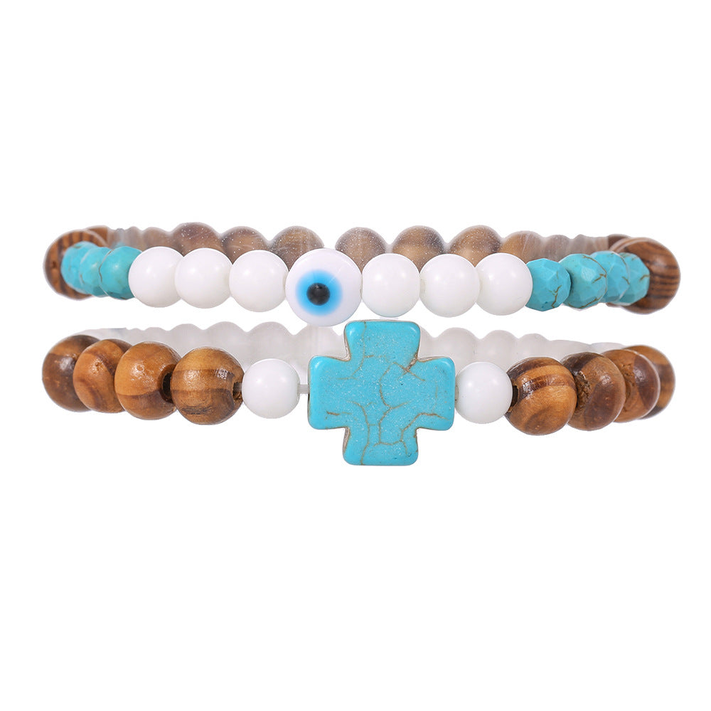 Bracciale Unisex con Perline Turchesi e in Porcellana, Perle in Legno e Ciondolo a Croce Geometrica