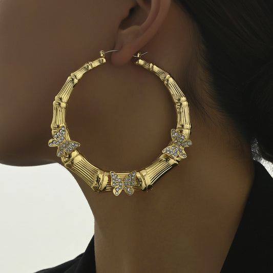 Orecchini da donna alla moda a forma di farfalla con intarsi di strass in lega di zinco e perni in acciaio inossidabile