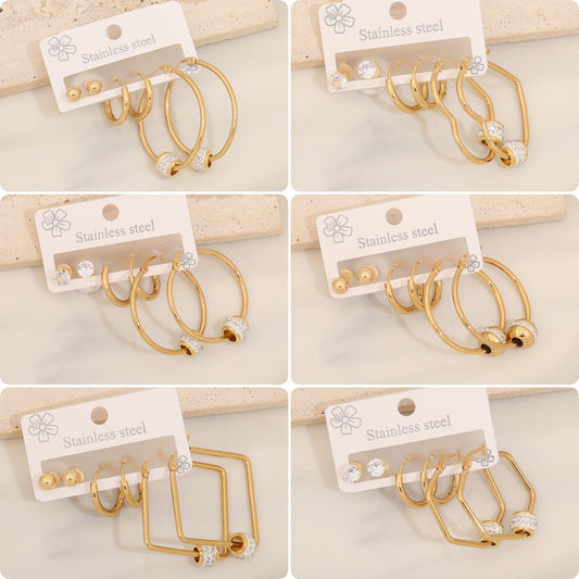 Pendientes de botón geométricos de acero inoxidable a la moda con detalles de corazón de diamantes de imitación para mujer