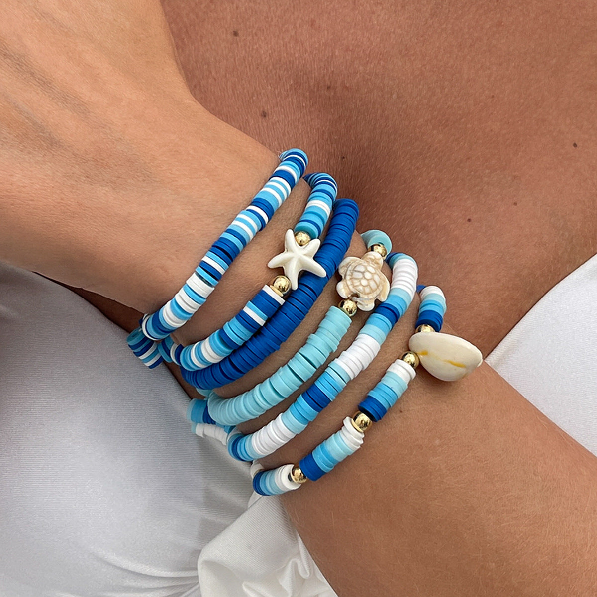 Set di bracciali in argilla polimerica a forma di fiore, in stile bohémien da spiaggia, con perline colorate e lavorazione artigianale