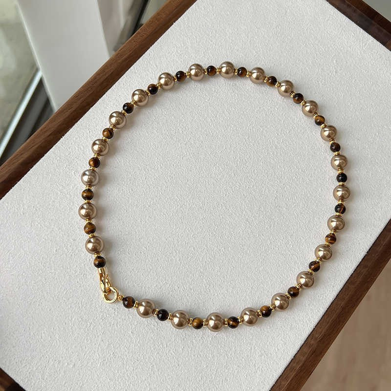 Collana pendente occhio di tigre in stile retrò con design geometrico da donna, catena a maglie color oro, accessorio minimalista di lusso