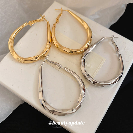 Orecchini a cerchio da donna minimalisti placcati in argento con goccia d'acqua, leggeri e lussuosi