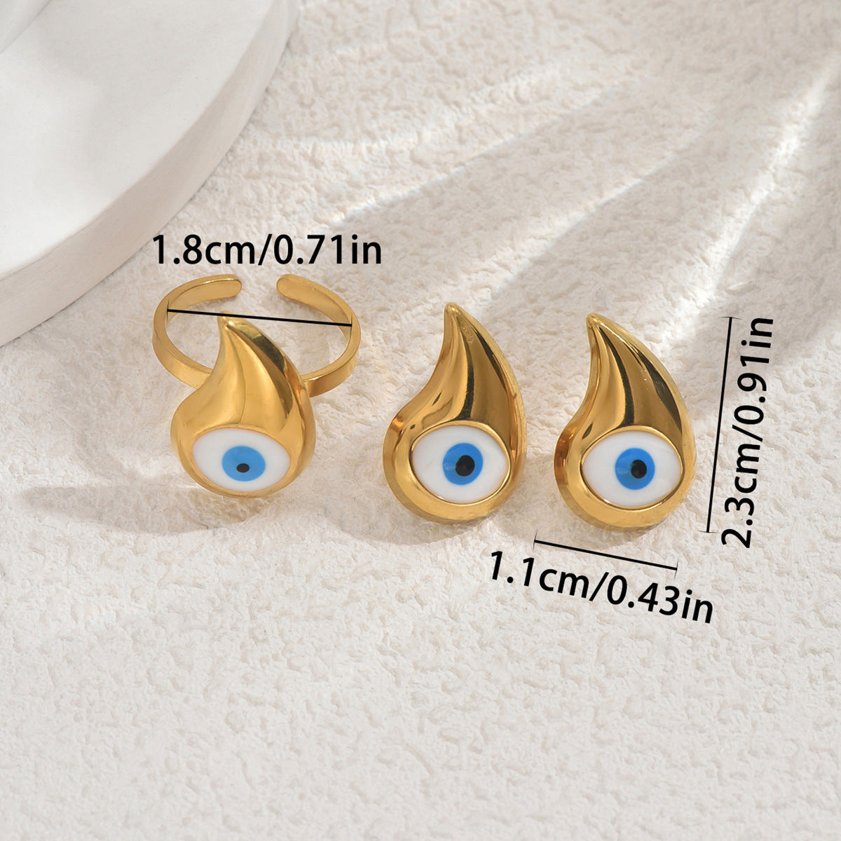 Elegante conjunto de anillo y pendientes de cobre esmaltado con forma de ojo para mujer