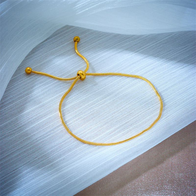 Set Collana e Bracciale da Donna Minimalisti in Acciaio al Titanio a Maglia Serpente con Finitura Placcata