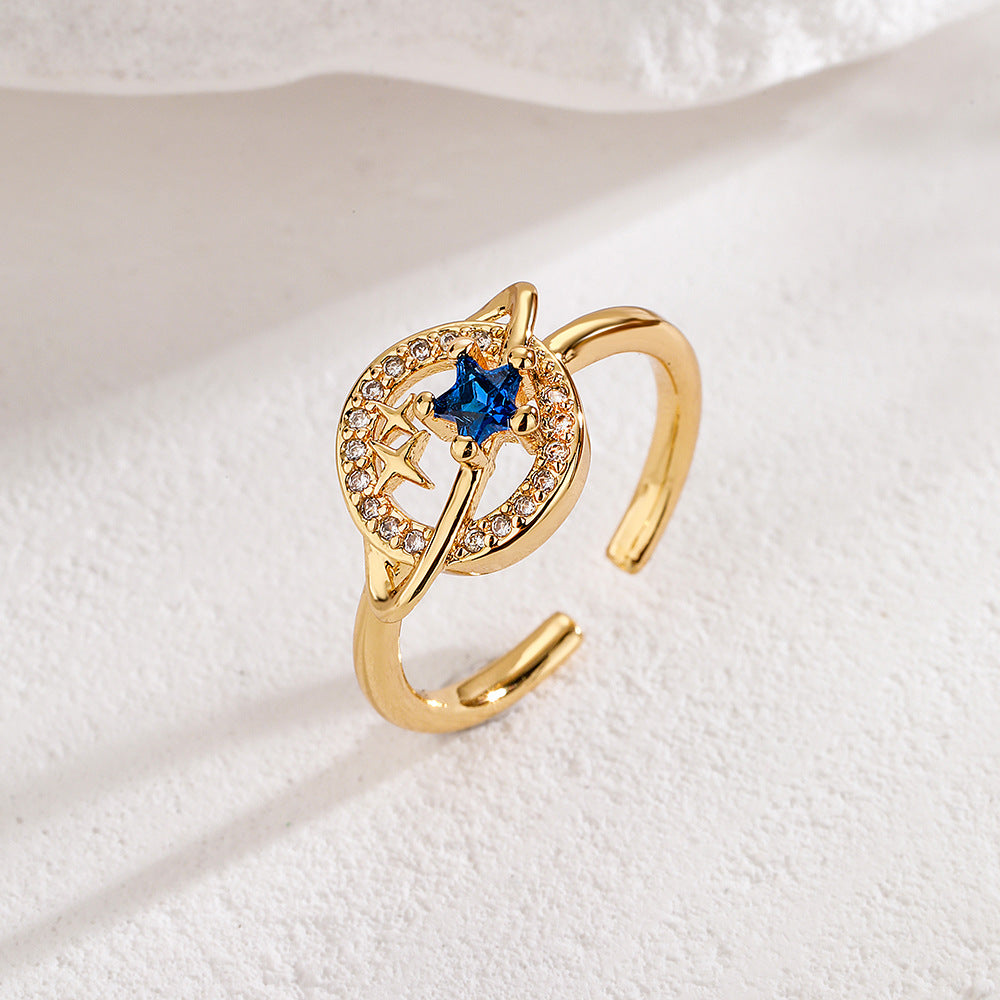 Anello geometrico aperto da donna con base in rame placcata in oro vero e testa di toro e design del pianeta in zircone micropavé