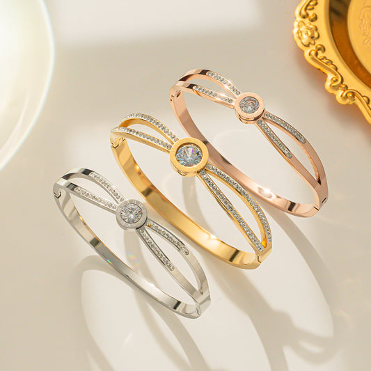Romantic Double-Ring Rose Gold Plated Titanium Steel Bracelet for Women with Zircon Accents, Geometric Circular Design, Fashionable and Creative Accessory