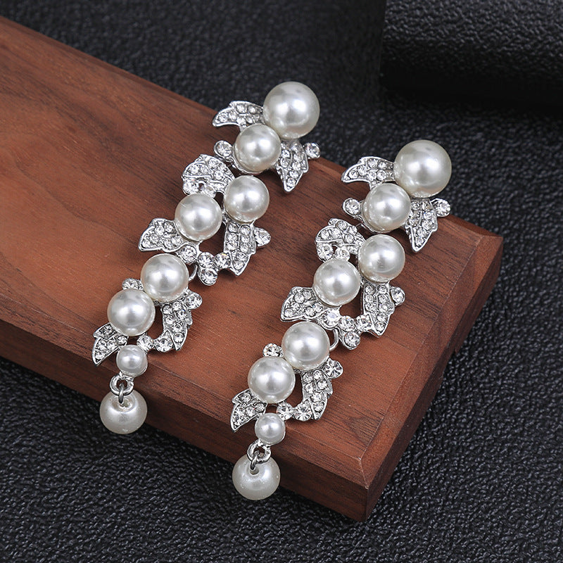 Minimalist Leaf-Shaped Alloy Earrings with Plated Finish for Women Elegant Pearl Drop Design Fashion Jewelry