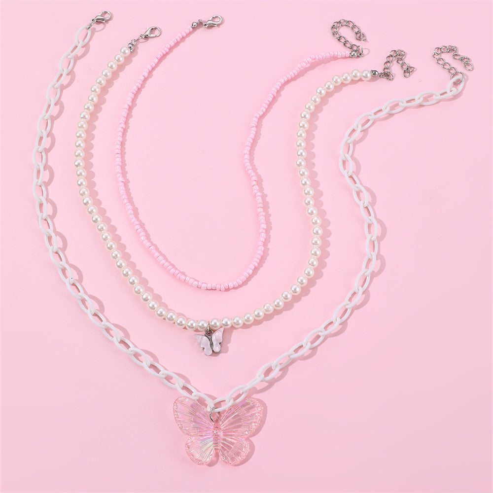 Set collana con ciondolo a farfalla rosa per bambine con ciondolo in resina e catena di perle in stile principessa per primavera ed estate