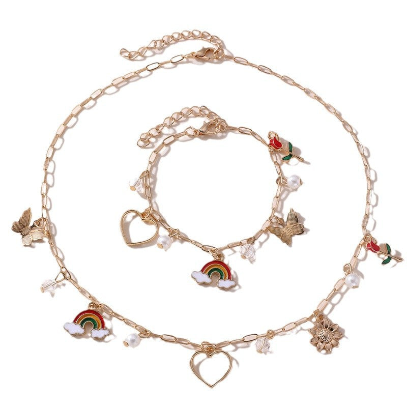 Collana con ciondolo a farfalla floreale e fiocco per bambine, lega di zinco, design a cuore, arcobaleno e rosa