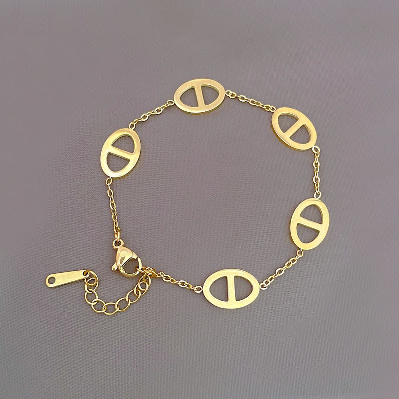 Minimalist Vintage Titanium Steel Zodiac Bracelet for Women and Men with Four-Season Bean and Water Ripple Pattern