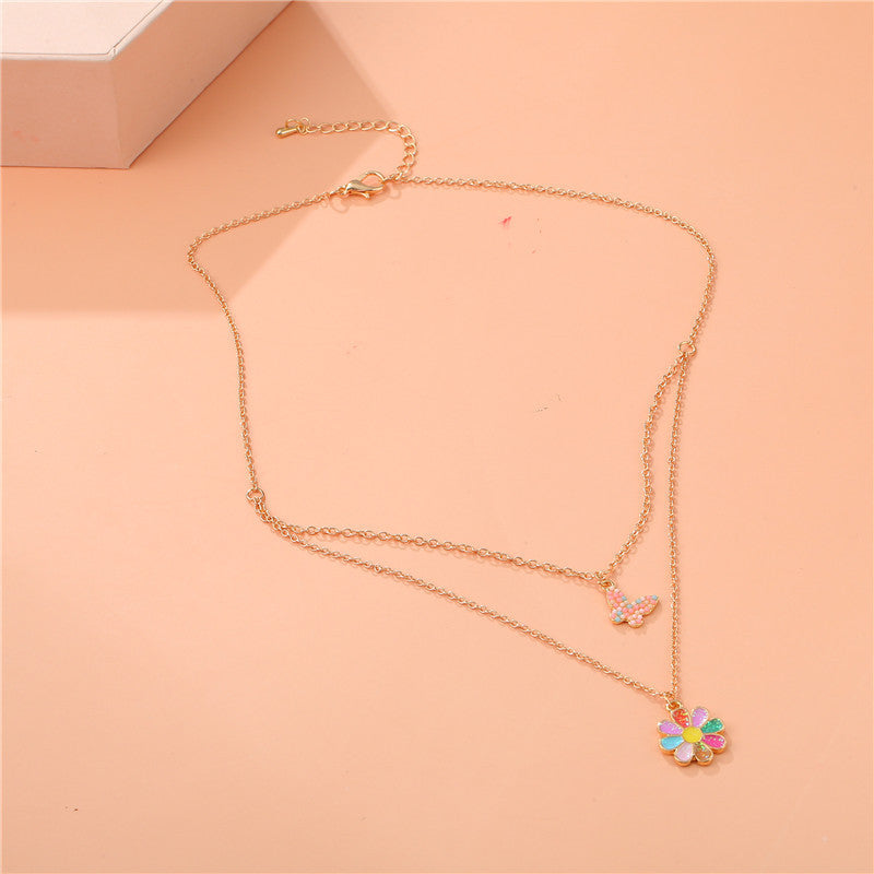 Collana con Ciondolo Girasole Cartone Animato per Bambini, Collana Multistrato a Farfalla in Lega con Finitura Smaltata e Catena a Croce