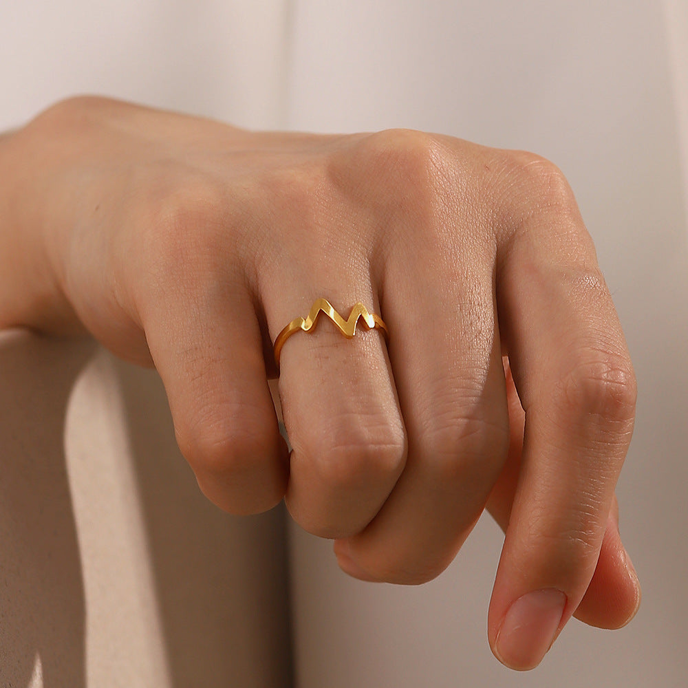Anello da donna in acciaio al titanio placcato oro 18K, geometrico, minimalista, ispirato alla Francia, con design a battito cardiaco